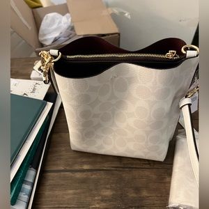 New Mollie bucket bag 22” signature canvas and new wallet. 8x81/5x4 never used.